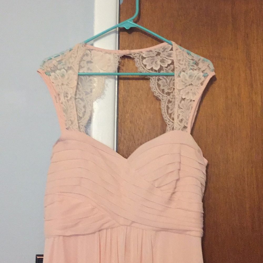 Light pink bridesmaid dress.